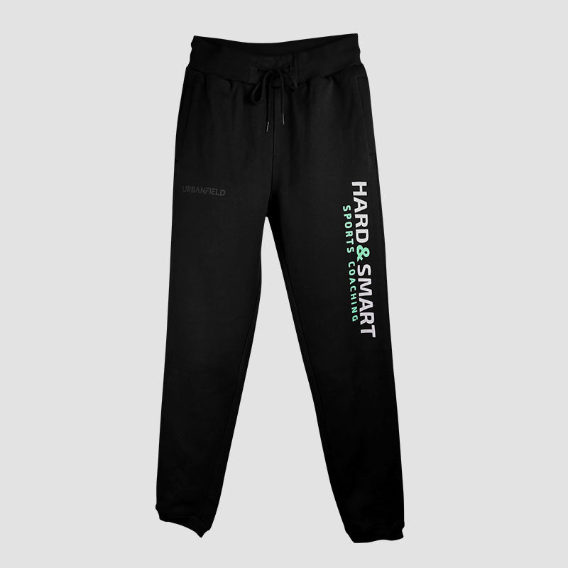 Front view of Hard & Smart Sports Coaching joggers in black