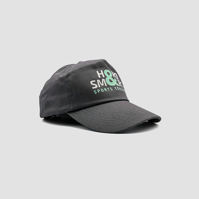 Side view of Hard & Smart Sports Coaching baseball cap in graphite grey