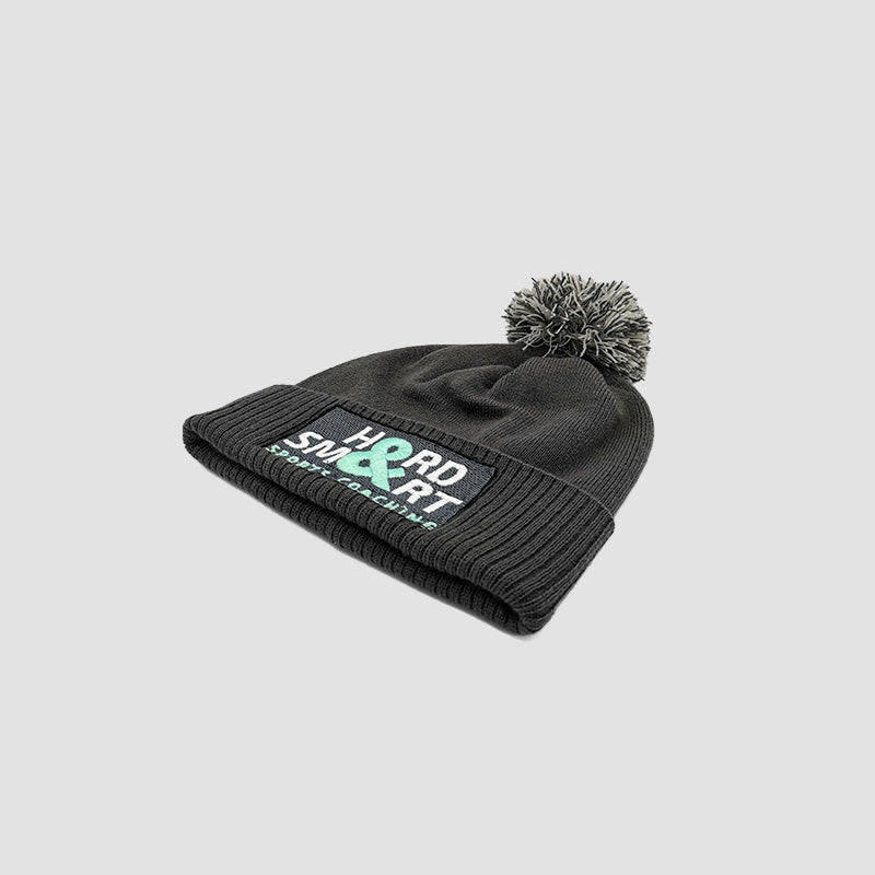 Close up of Hard & Smart Sports Coaching beanie in graphite grey