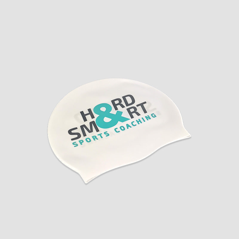 Faraway view of Hard & Smart Sports Coaching swimming cap in white